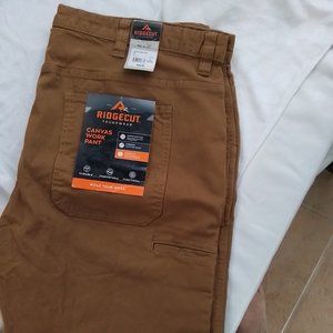 Canvas work pants. Ridgecut by Tractor Supply.   Side pocket on leg. Tan